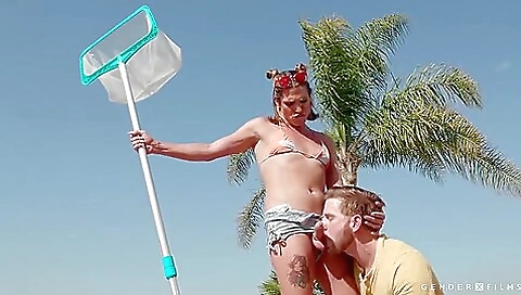 Busty blonde in a bikini gets her pussy fucked outdoors