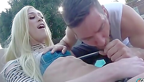 Guy fucks a pretty blonde in the pool with a big cock