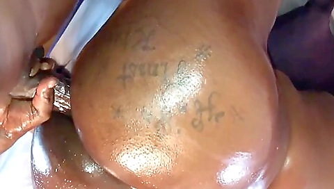 Busty ebony hottie with a tattooed ass fucked by a big cock